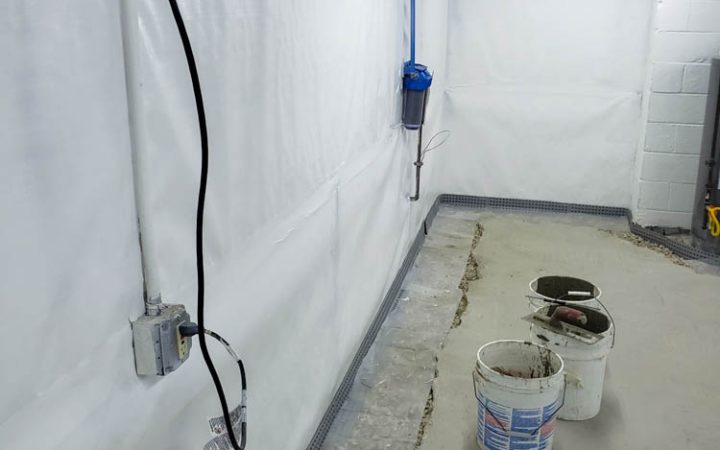 Basement undergoing reconstruction for waterproofing project